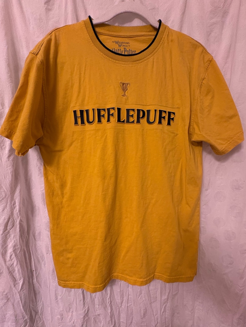 Team Hufflepuff raised graphic tee. Men’s medium, women’s large.